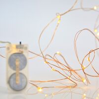 ΣΕΙΡΑ, 12 MINI LED, ΜΠΑΤΑΡΙΑΣ 2xCR2032, ΜΠΡΟΝΖΕ ΧΑΛΚΙΝΟ ΚΑΛΩΔΙΟ, ΘΕΡΜΟ ΛΕΥΚΟ LED ANA 10cm, IP20